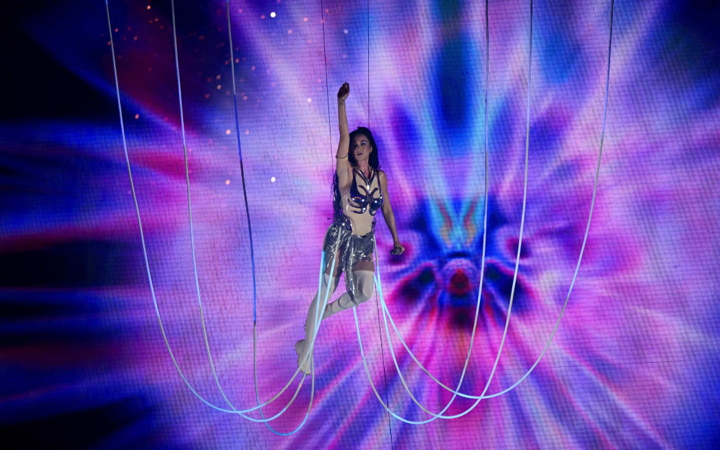 (FILES) US singer Katy Perry performs during the Rock in Rio music festival in the Rio 2016 Olympic Park in Rio de Janeiro, Brazil, on September 20, 2024. Perry is set to "shoot across the sky" this spring when she lifts off as part of a six-member, all-female crew on Blue Origin's next space flight, the company announced on February 27, 2025. As if answering the call of her hit song "E.T.," Perry will embark on a star-studded journey alongside journalist Lauren Sanchez, who is Blue Origin owner Jeff Bezos's fiancee, and CBS Mornings co-host Gayle King. (Photo by MAURO PIMENTEL / AFP)