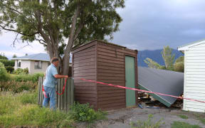 Tony Guthrie at his earthquake-damaged home beside Lyell Creek.