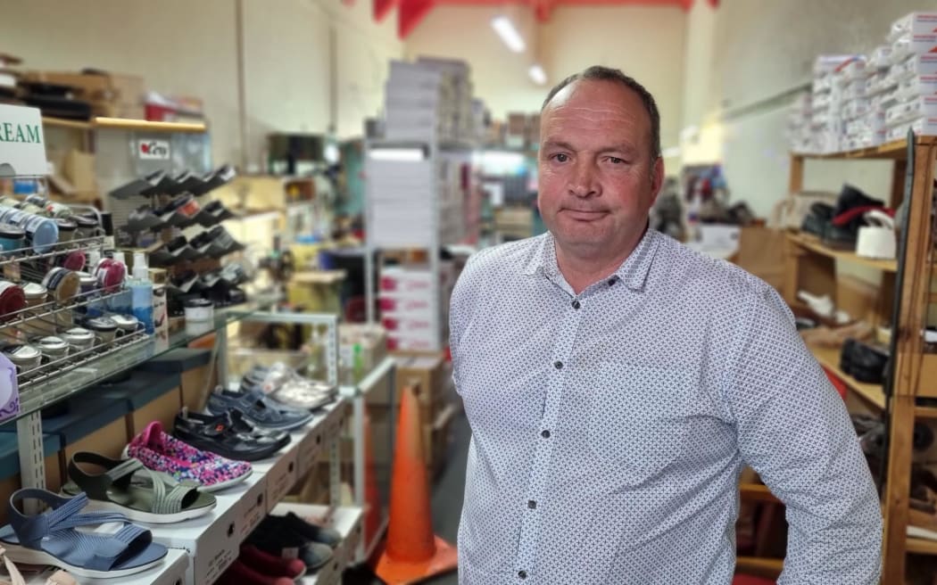 Matthew McDonald of Matthew & Co Real Estate owns the building which houses his offi es and Scarpa's Shoes. He says Stratford is becoming a ghost town