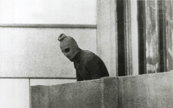 A Fairfax photographer captured one of the defining images of the Munich Olympics in 1972. This Palestinian is one of a group that had taken 12 Israeli athletes hostage.