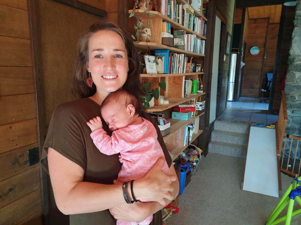 Wellington woman Lindy Jacomb, pictured here with her newborn daughter Aria, was excommunicated by the Exclusive Brethren 13 years ago when she was barely out of her teens.