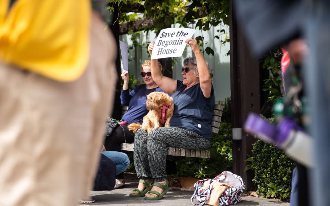 People outside a sit-in at the Begonia House.