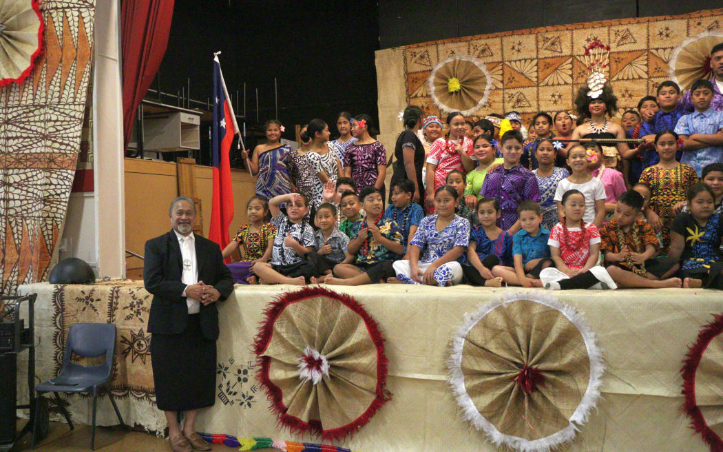Naenae Primary School’s Samoan bilingual unit with Kalapu Masoe standing at the bottom of the stage.