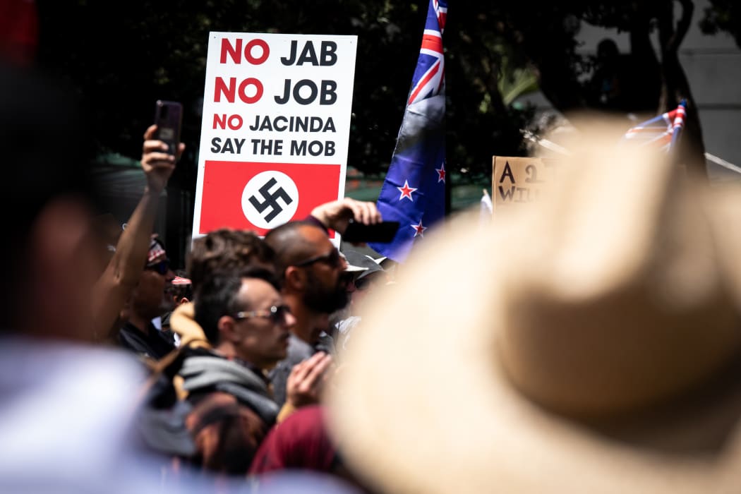 'No jab no job no Jacinda say the mob'. Mob is an interesting self-description. Often when people protest against what they see as facism they draw a diagonal through a swastika. At this protest there were many but I saw none crossed out.