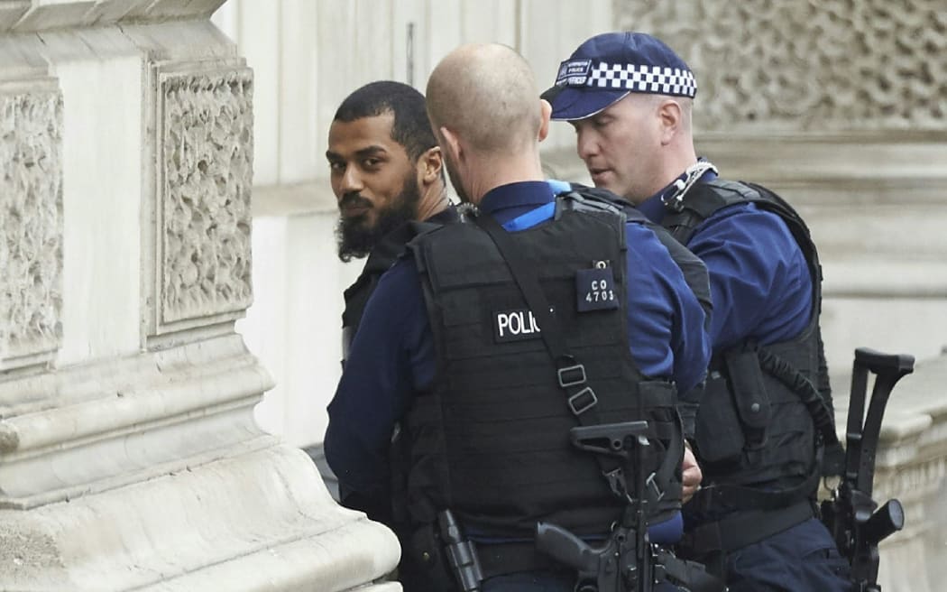 Police detained the man near Whitehall.