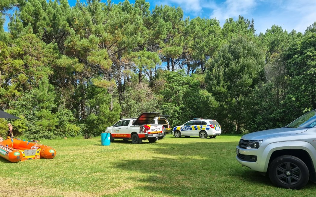 Emergency services at Opoutere Beach after a group of seven people got into trouble in the water.