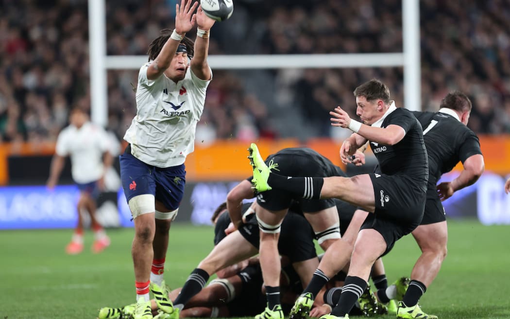  Cam Roigard of New Zealand box kicks the ball over Mickael Guillard of France during the Lipovitan-D Series v France - New Zealand All Blacks v France rugby match at Forsyth Barr  Stadium, Dunedin. 5 July 2025. © Copyright image by Peter Meecham / www.photosport.nz