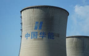 Chimneys at a coal-fired power plant of China's electricity giant Huaneng Group in Tianjin, China