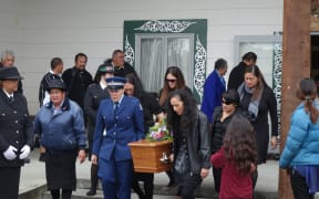 Mourners at the funeral carrying Lady Latimer's coffin