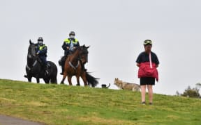 Police on horseback patrol Sydney Park on September 18, 2021, following calls for an anti-lockdown protest rally amid the coronavirus pandemic.