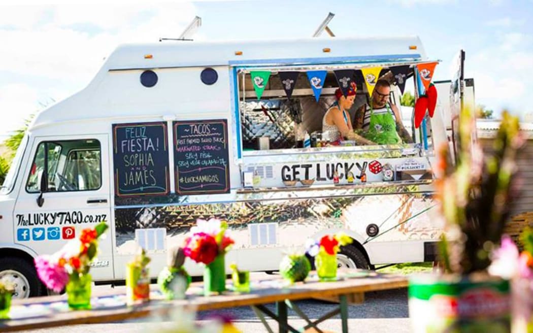 Auckland couple Sarah and Otis Frizzell at work in their food truck The Lucky Taco