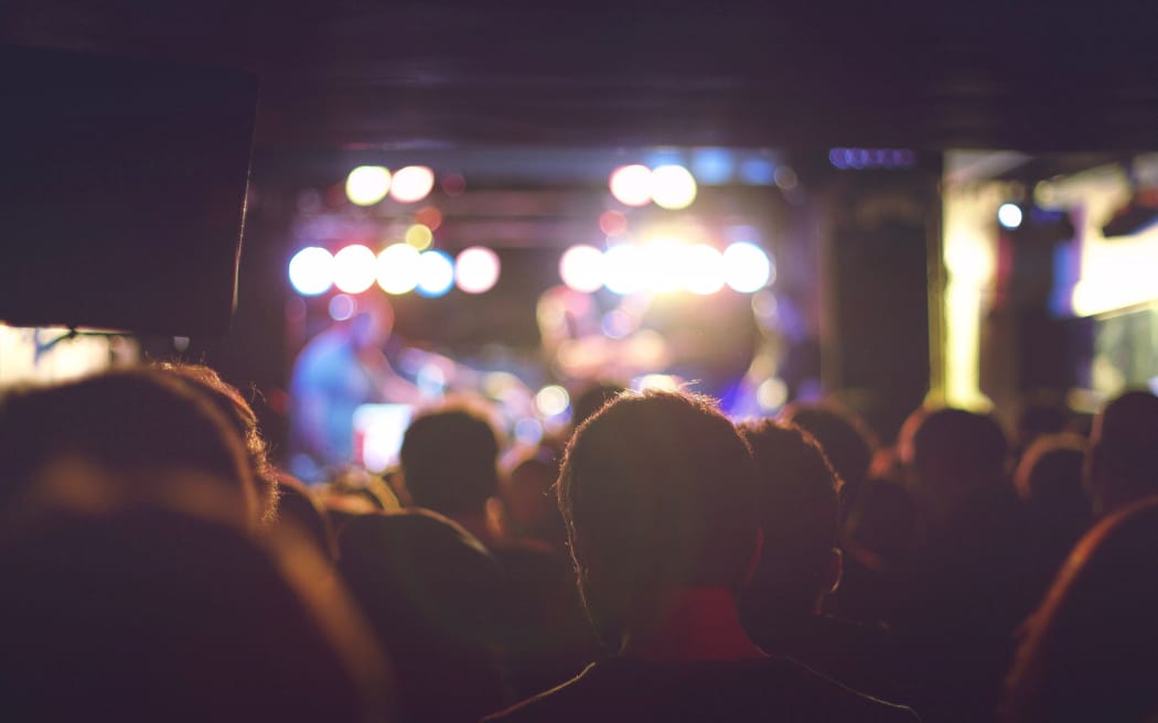 Audience watching live music.