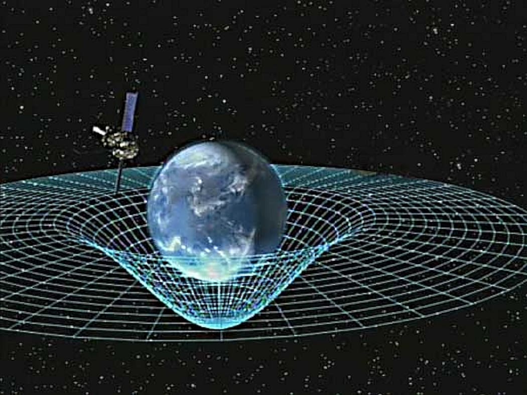 Einstein's ground-breaking ideas was that space and time are warped by the presence of massive objects.