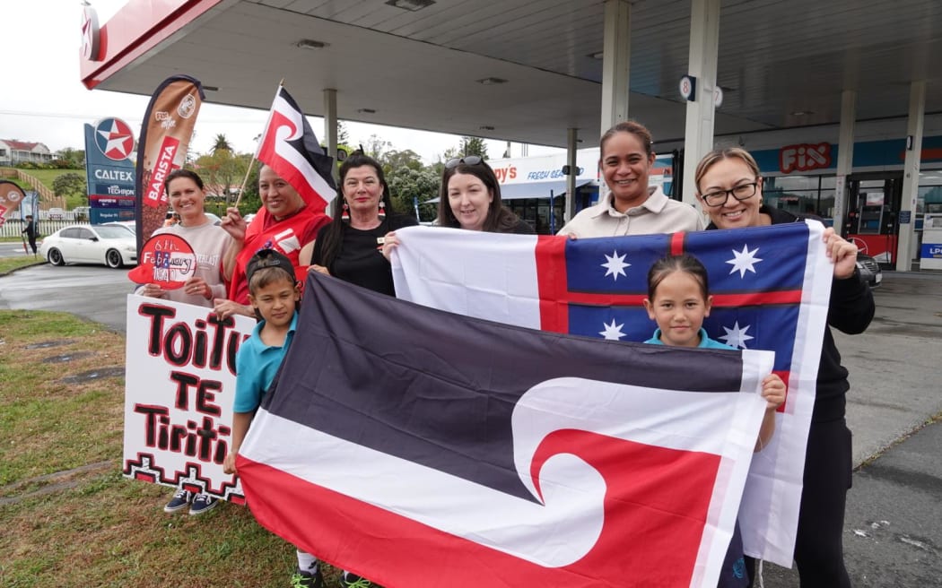 Ngāti Hine Health Trust staff, and others, wait to welcome Te Hīkoi mō te Tiriti, as it draws closer to Kawakawa, on its first day, 11 November, 2024.