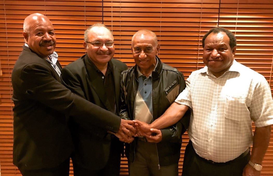 Bonding time: Powes Parkop (Leader of the Social Democratic Party), Peter O’Neill (Leader, of the People’s National Congress Party), Sir Julius Chan (of the People's Progress Party) and William Duma (Leader of the United Resources Party).