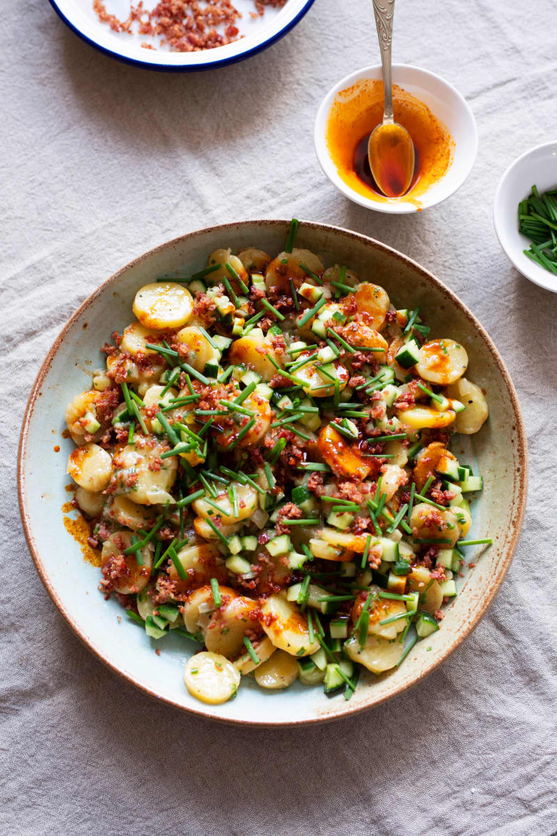 A big bowl of colourful potato salad.