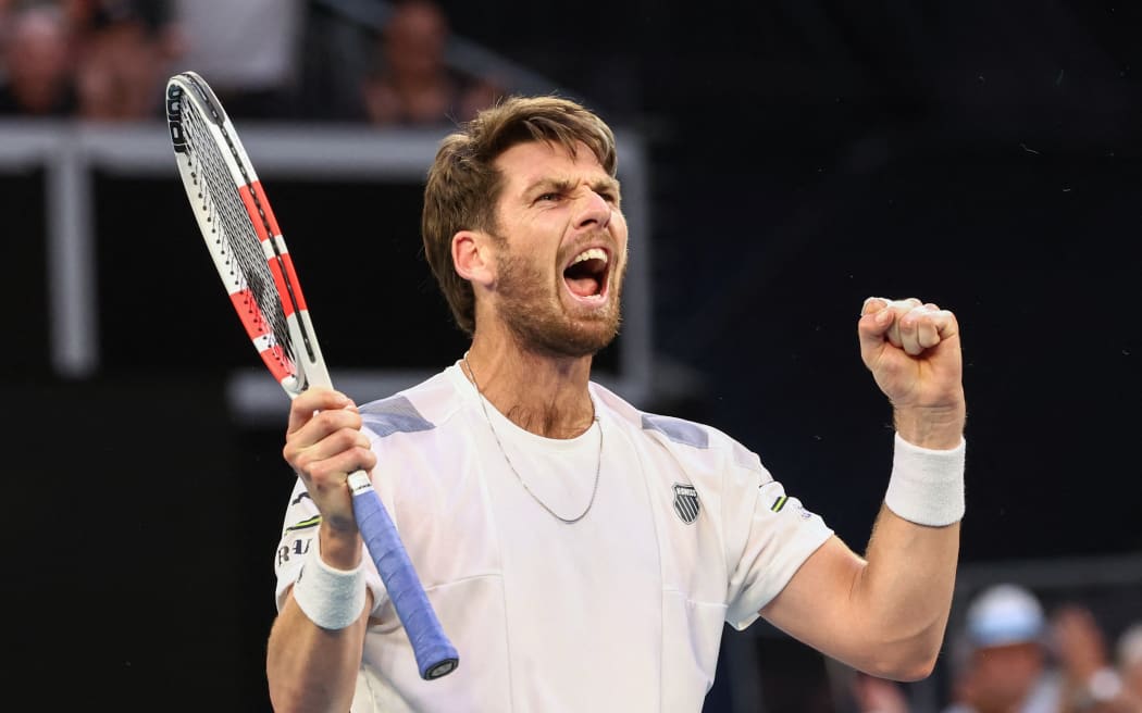 Britain's Cameron Norrie celebrates after victory against Norway's Casper Ruud in their men's singles match on day seven of the Australian Open tennis tournament in Melbourne on January 20, 2024. (Photo by David GRAY / AFP) / -- IMAGE RESTRICTED TO EDITORIAL USE - STRICTLY NO COMMERCIAL USE --