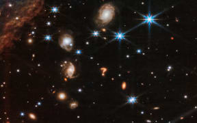 A zoomed in version of the tightly bound pair of actively forming stars, known as Herbig-Haro 46/47, captured by NASA's James Webb telescope.
