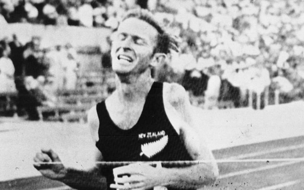 New Zealand runner Murray Halberg crosses the finish line in the 5,000-metre event at the 1969 Rome Olympics - winning a Gold medal.