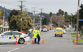The scene where a child died after being struck by a truck.