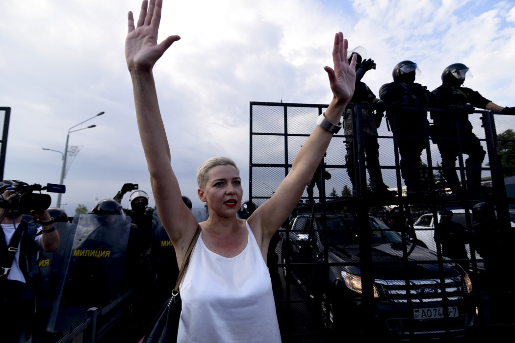 Belarusian musician and political activist Maria Kolesnikova is seen in front of the security forces standing guard to block protestors from reaching the Presidential Palace as people continue to protest over the presidential election in the capital Minsk, Belarus on August 30, 2020.