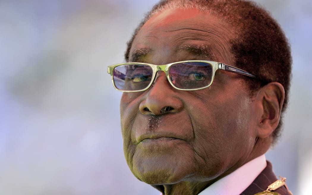 A picture taken on August 22, 2013 shows Zimbabwean President Robert Mugabe attending his inauguration and swearing-in ceremony at the 60,000-seater sports stadium in Harare.