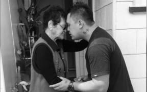 Rhys Delamere giving his nana Rev Libya Heke-Huata a hongi.