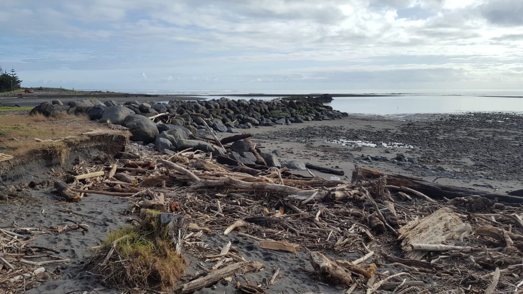 East Beach residents say the Taranaki Regional Council's "half-tide wall" is directing storm surges towards their homes.