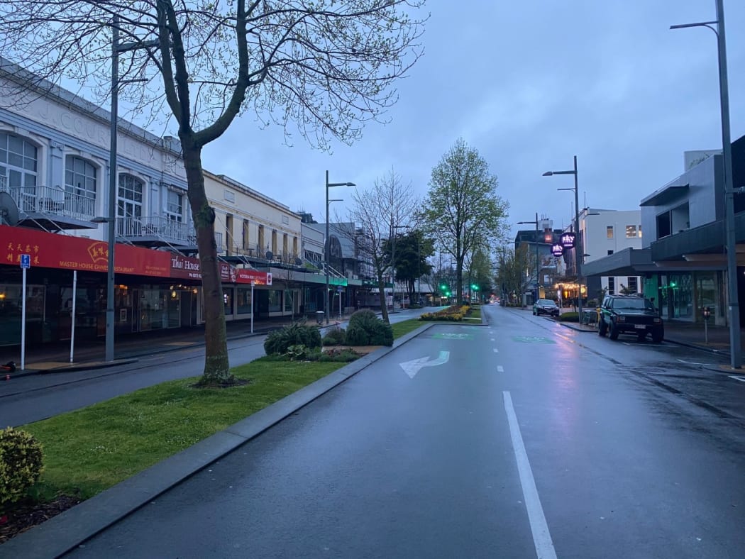 A quiet Hamilton street on Monday as part of the Waikato region starts five days of alert level 3 following two community cases of Covid-19.