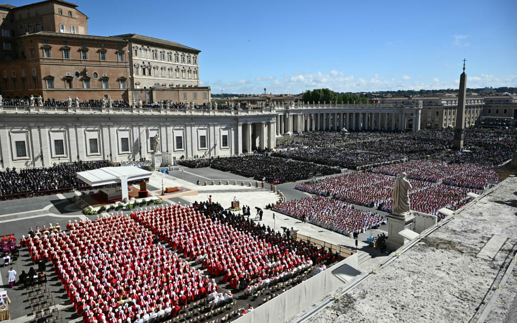 A general view shows attendees during late Pope Francis' funeral ceremony at St Peter's Square at the Vatican on April 26, 2025. (Photo by Mandel NGAN / AFP)