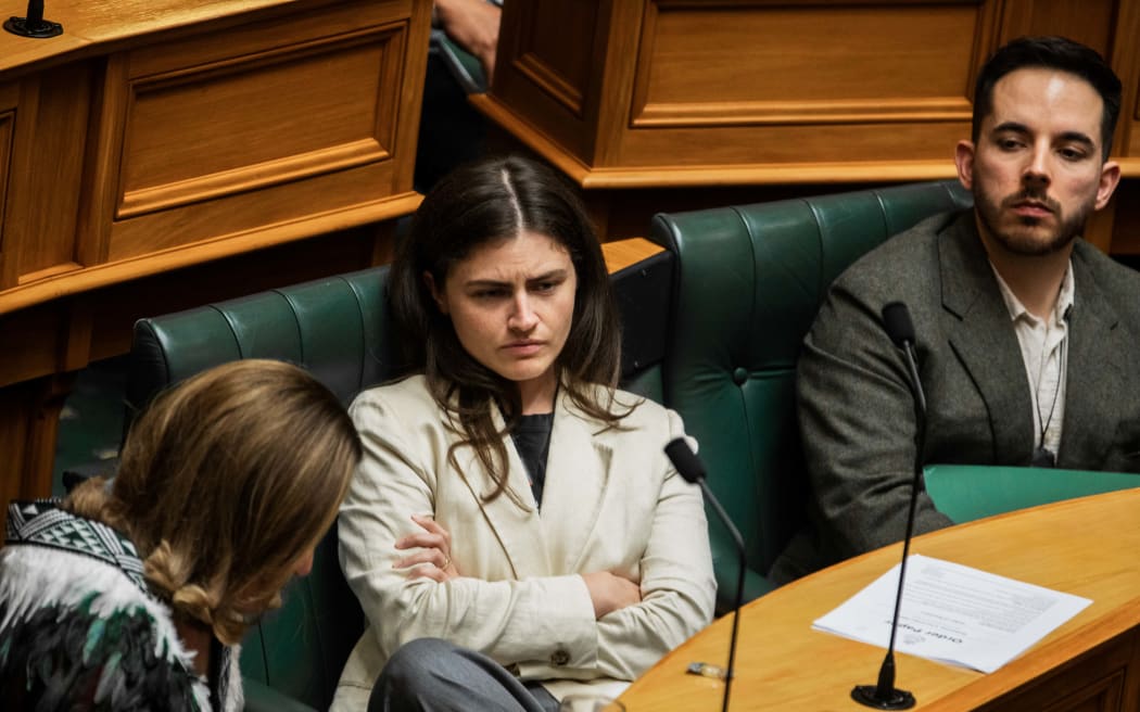 Chloe Swarbrick reacts to Christopher Luxon in the House