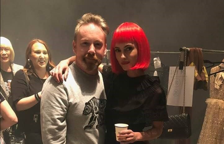 Fashion designer Adrian Hailwood backstage at last year's New Zealand Fashion Week with model Lilly Montana.