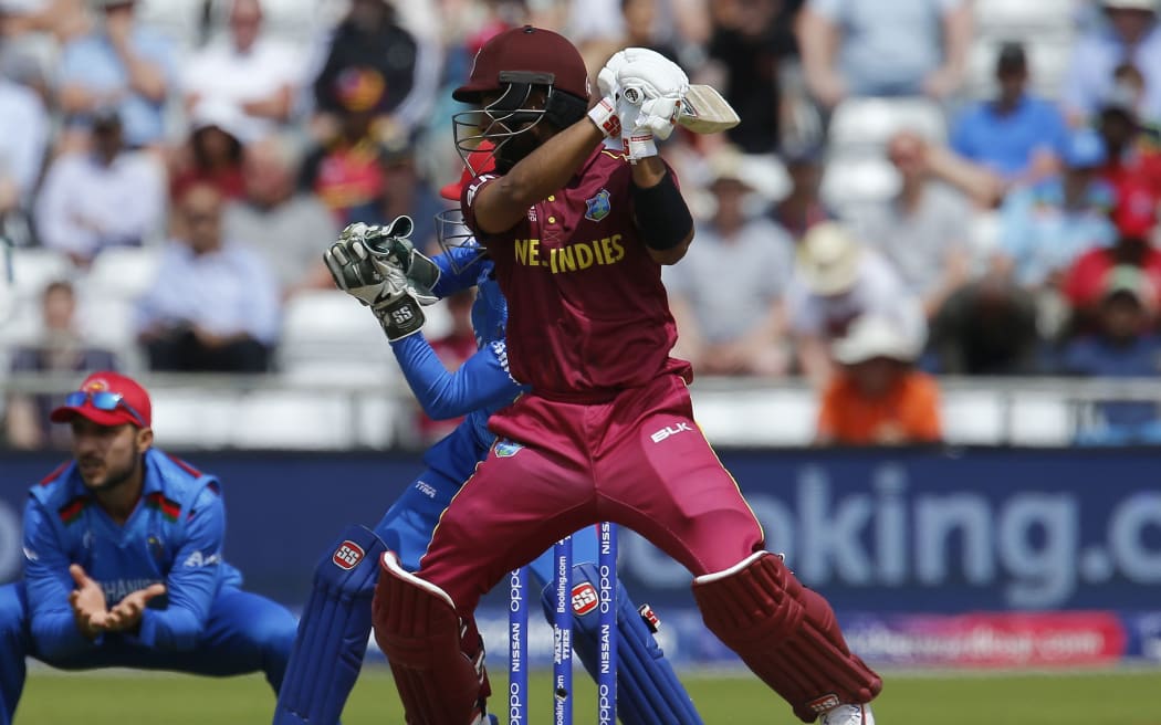 Shai Hope of the West Indies forces the ball away outside the off stump.