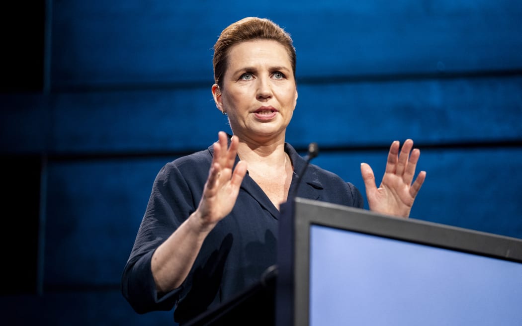 (FILES) Denmark's Prime Minister Mette Frederiksen addresses participants of the 7th annual Copenhagen Democracy Summit at the Royal Danish Playhouse in Copenhagen on May 14, 2024. Danish media reports that PM Mette Fredriksen was assaulted in central Copenhagen on June 7, 2024, allegedly hit in the face, shocked but no serious injuries. (Photo by Ida Marie Odgaard / Ritzau Scanpix / AFP) / Denmark OUT