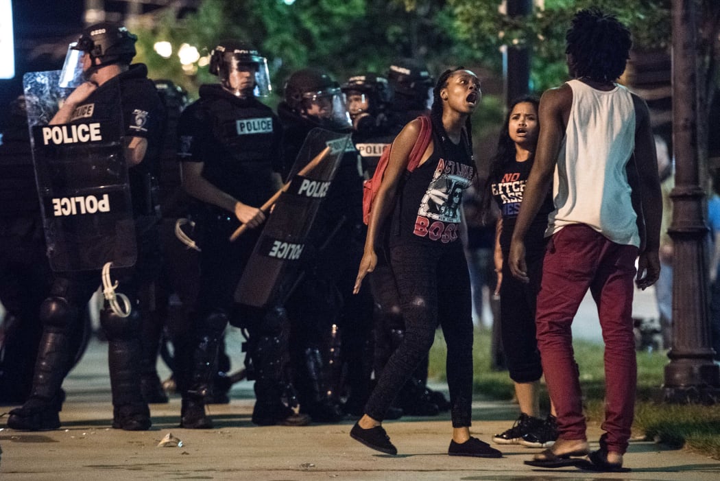 Demonstrators arguing during protests in Charlotte, North Carolina.