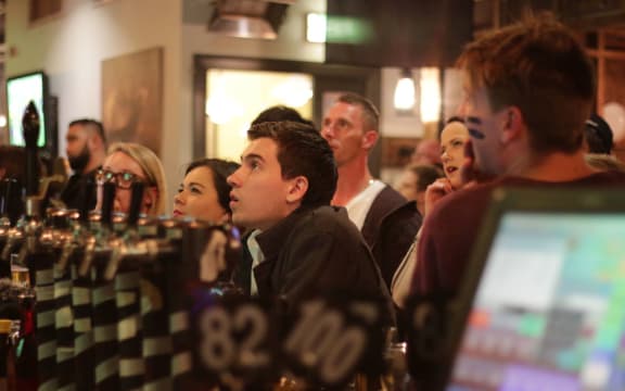 Fans watch nervously during the second half of the RWC 2015 final.