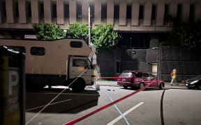Protesters have set up strops, connecting them to cross entry points. Cars and large campers are blocking Aitken Street.