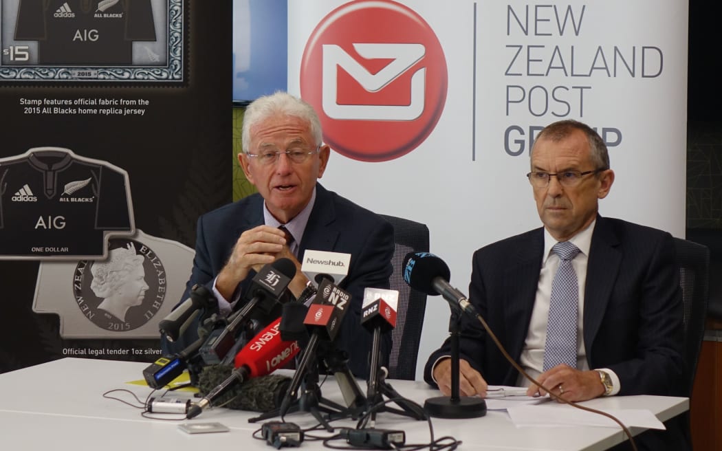 NZ Post chairman Sir Michael Cullen and chief executive Brian Roche announcing Kiwibank proposal on 6 April.