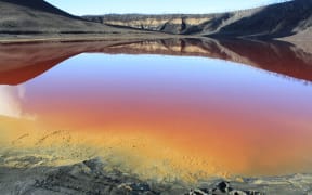 The lake surrounding the Manaro-Vui volcano has almost disappeared, and the remnants are heavily loaded with minerals, creating a blood-red colour.