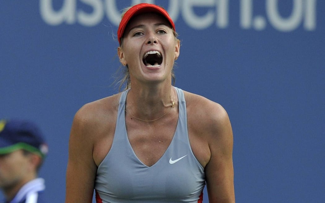 Maria Sharapova of Russia reacts during  match at the U.S. Open, 2014.