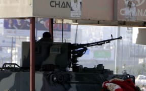 An armoured tank is seen at Sebin Square in Sana'a on 22 January.