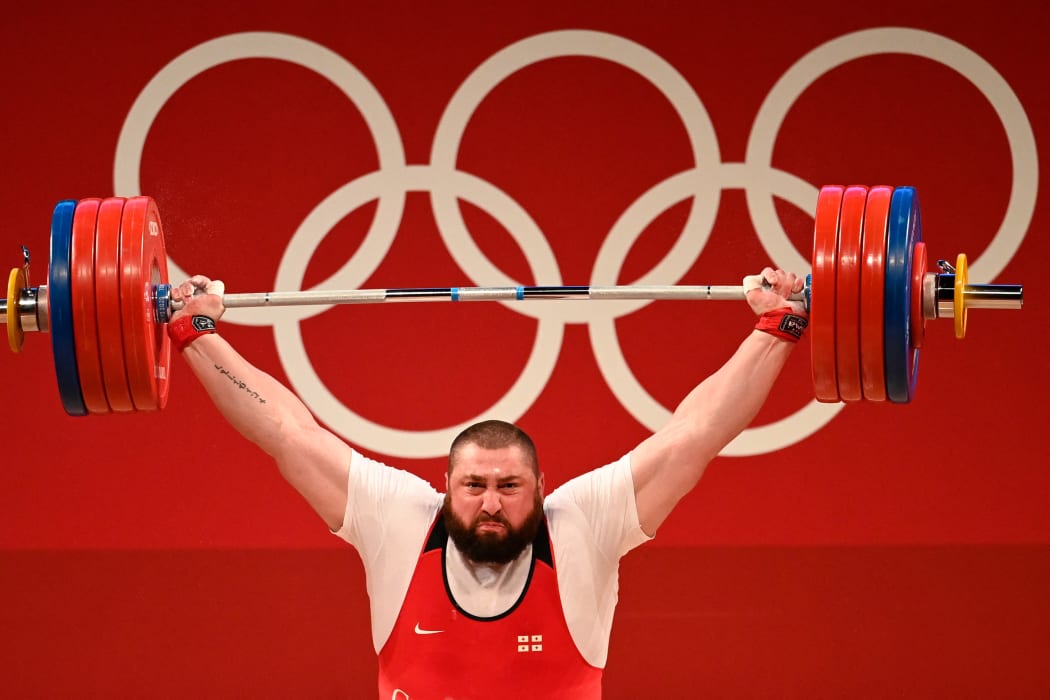 Georgia's Lasha Talakhadze competes in the men's +109kg weightlifting competition during the Tokyo 2020 Olympic Games.