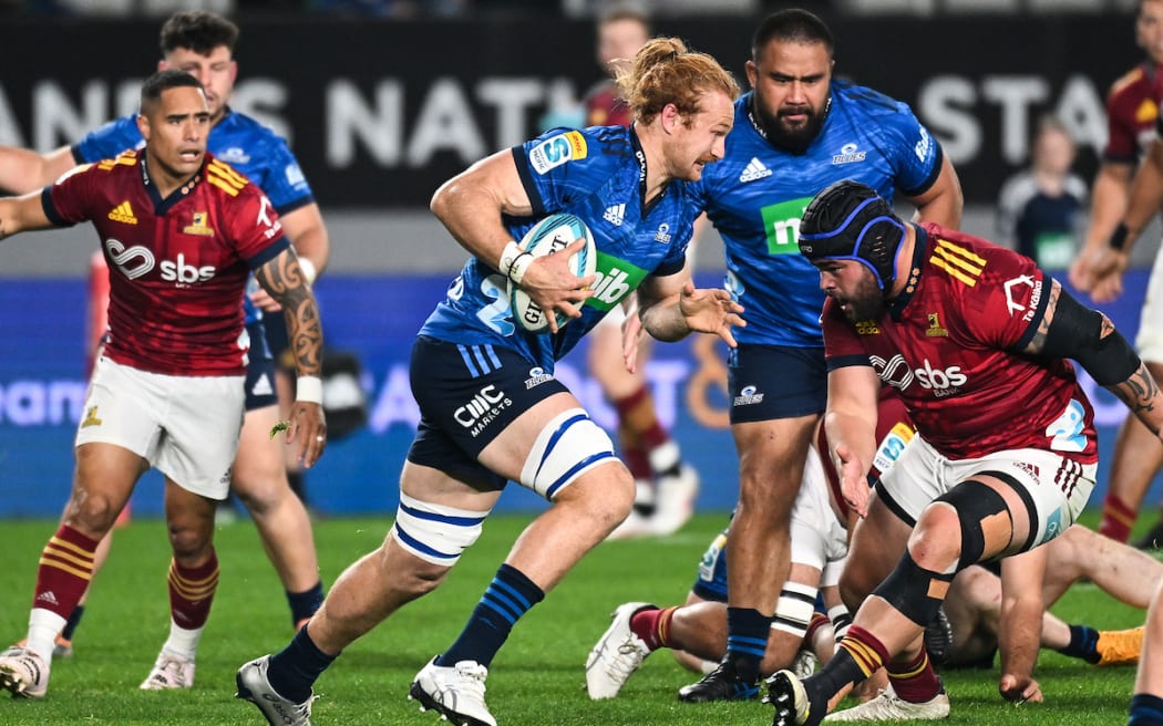 Tom Robinson in action for the Blues against the Highlanders.