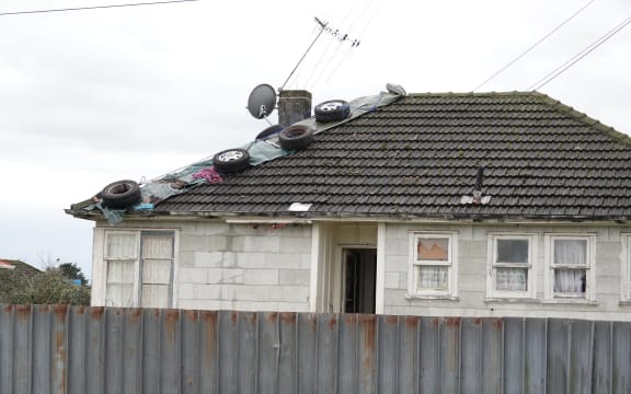 Many houses are still showing the effects of the tornado a fortnight ago.