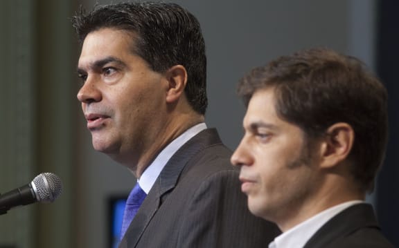 Jorge Capitanich (left) and Economy Minister Axel Kicillof.