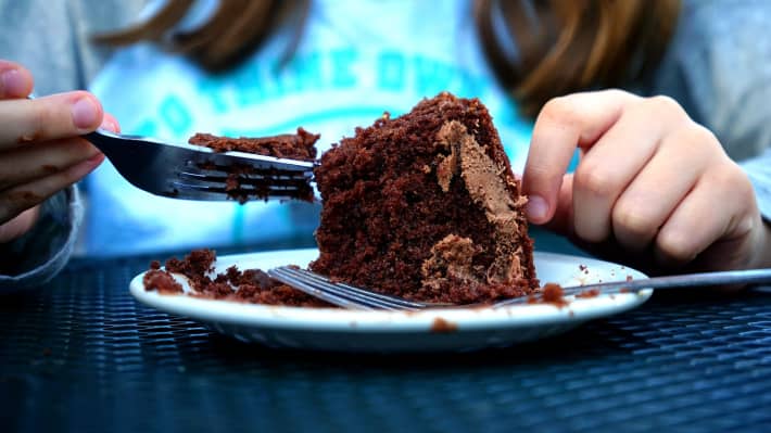 Chocolate cake being eaten