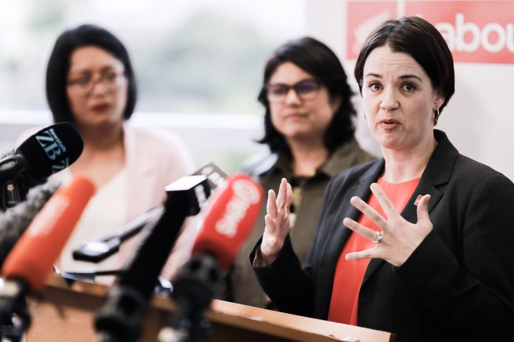 Labour Party president Claire Szabó, at podium)