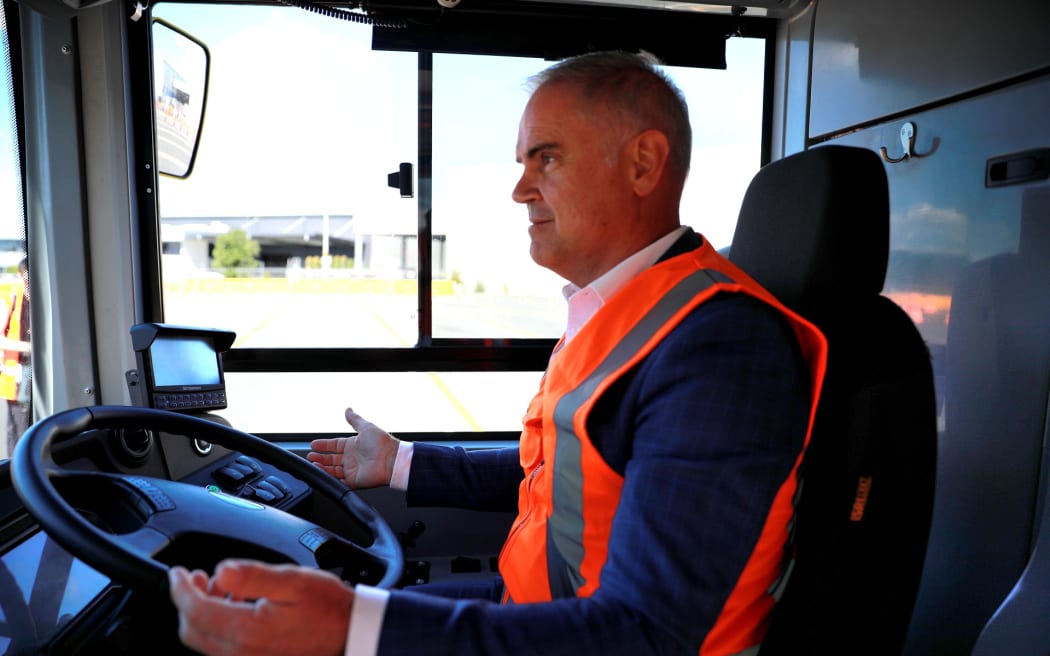 Auckland Transport CEO Dean Kimpton tries out a new electric double decker bus