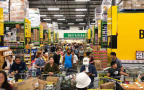 Shoppers at Pak'n'Save Wairau Park on the North Shore stock up on vital supplies the day after the first coronavirus case was announced in NZ.