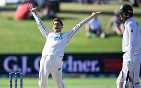 New Zealands' Mitch Santner appeals successfully for a LBW decision to dismiss South Africa's Tshepo Moreki on day four of the first cricket test against South Africa.